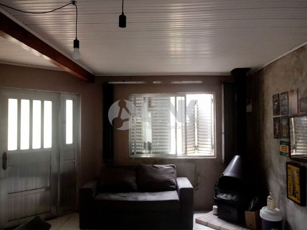 Casa à venda com 3 quartos, 100m² - Foto 1