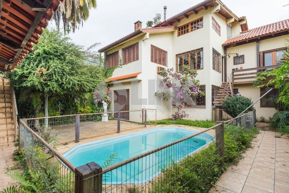 Casa à venda com 6 quartos, 410m² - Foto 1