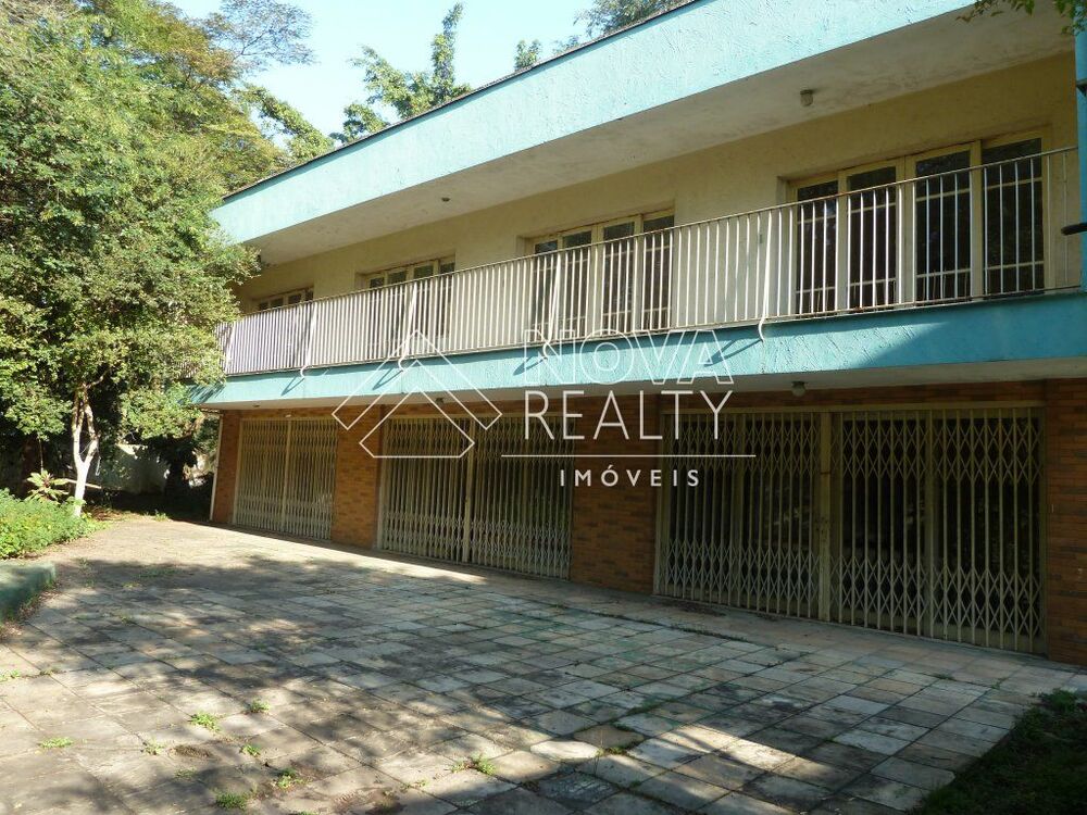 Casa para alugar com 5 quartos, 576m² - Foto 1