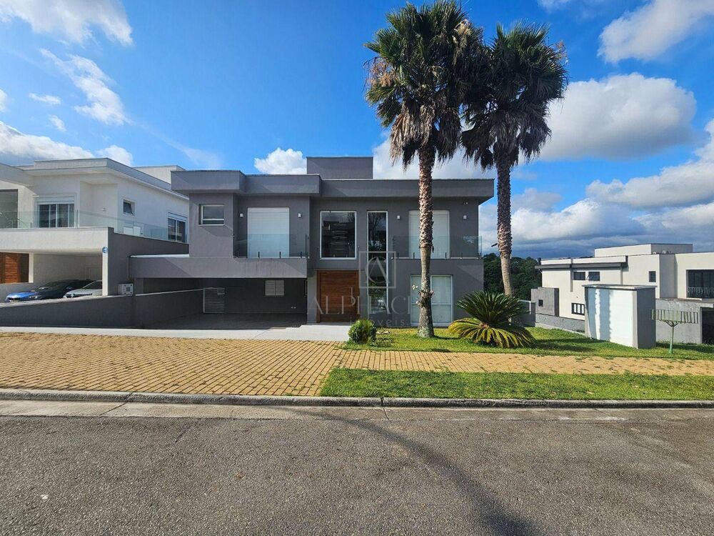 Casa de Condomínio à venda e aluguel com 4 quartos, 390m² - Foto 1