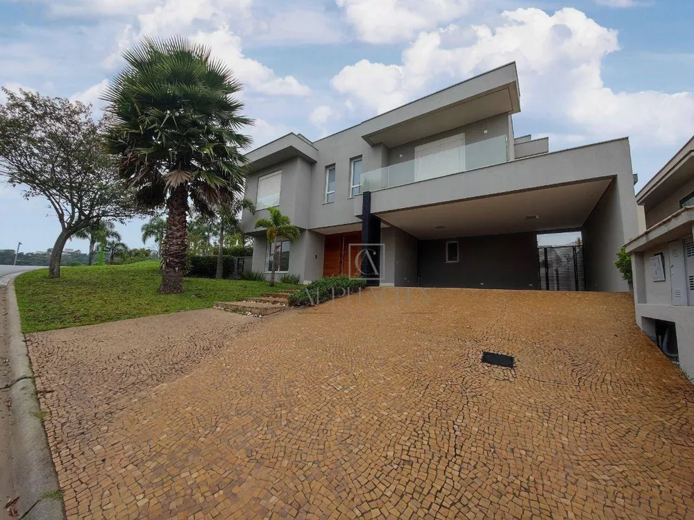 Casa de Condomínio à venda e aluguel com 4 quartos, 421m² - Foto 1