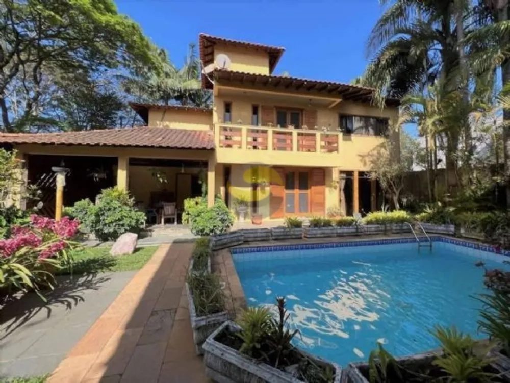 Casa de Condomínio à venda com 4 quartos, 342m² - Foto 1