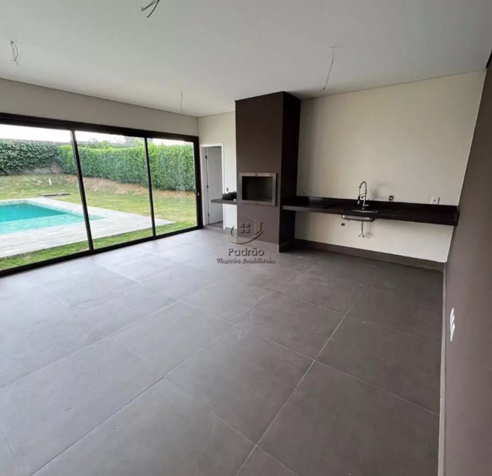 Casa de Condomínio à venda e aluguel com 4 quartos, 366m² - Foto 1