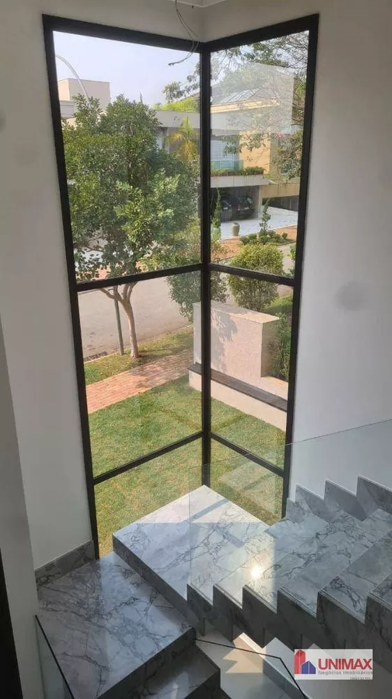 Casa de Condomínio à venda com 4 quartos, 452m² - Foto 1