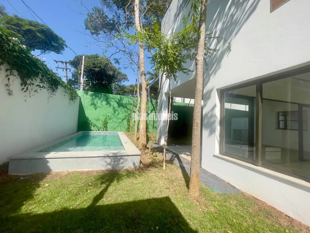 Casa de Condomínio à venda com 4 quartos, 380m² - Foto 2