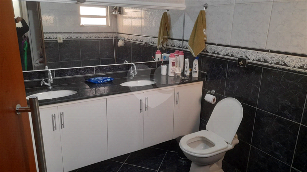 Sobrado à venda com 4 quartos, 180m² - Foto 32