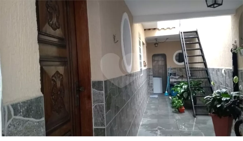 Casa à venda com 4 quartos, 77m² - Foto 4