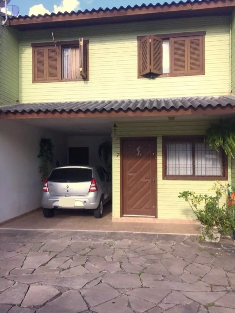 Casa à venda com 3 quartos, 100m² - Foto 1