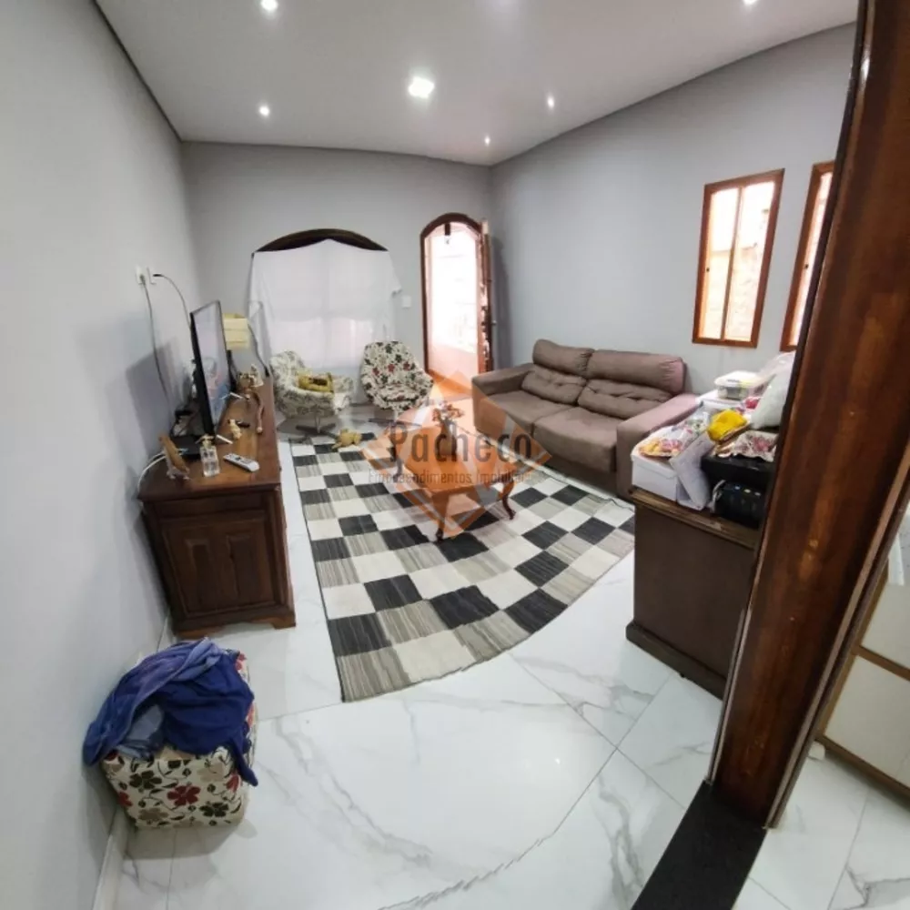 Casa à venda com 2 quartos, 100m² - Foto 1