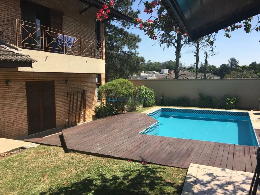 Casa à venda com 4 quartos, 334m² - Foto 1