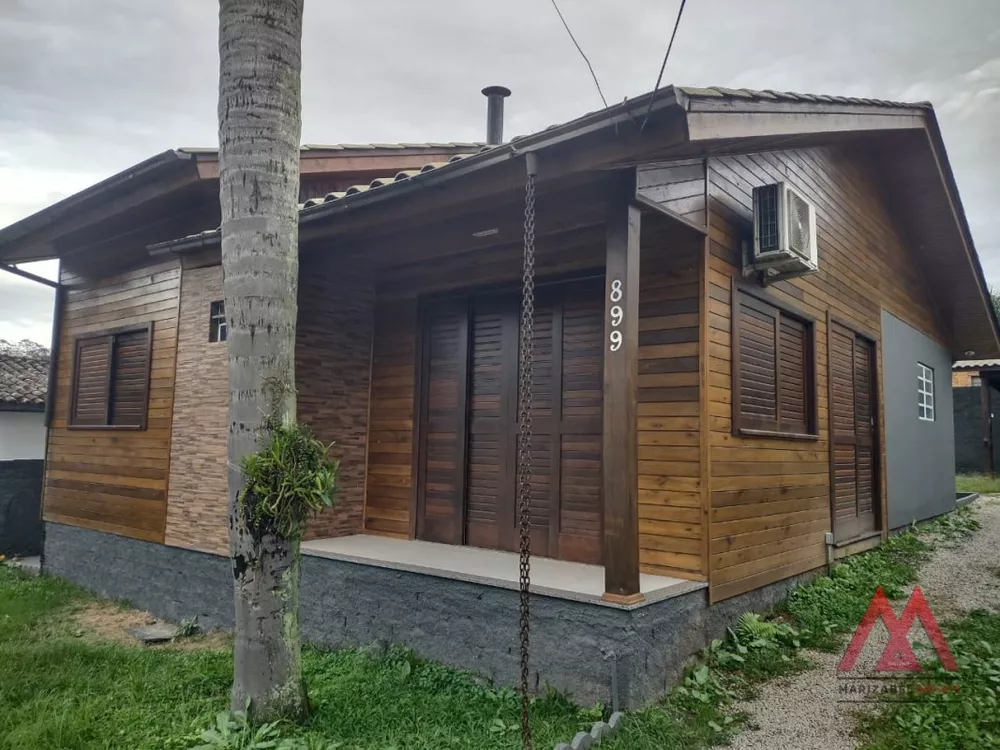 Casa à venda com 3 quartos, 100m² - Foto 1