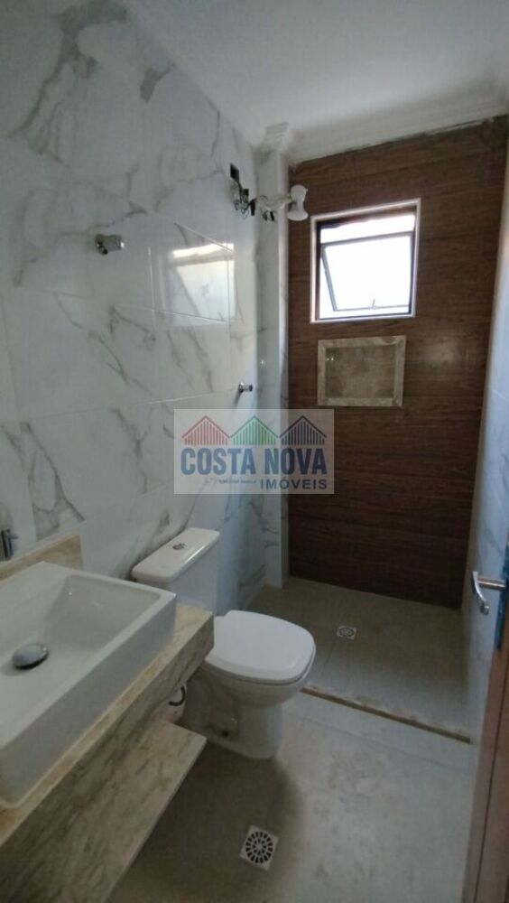 Casa à venda com 3 quartos, 100m² - Foto 1