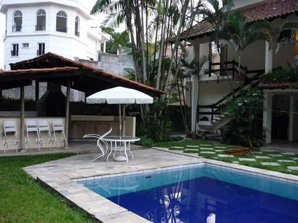 Casa de Condomínio à venda e aluguel com 4 quartos, 600m² - Foto 1