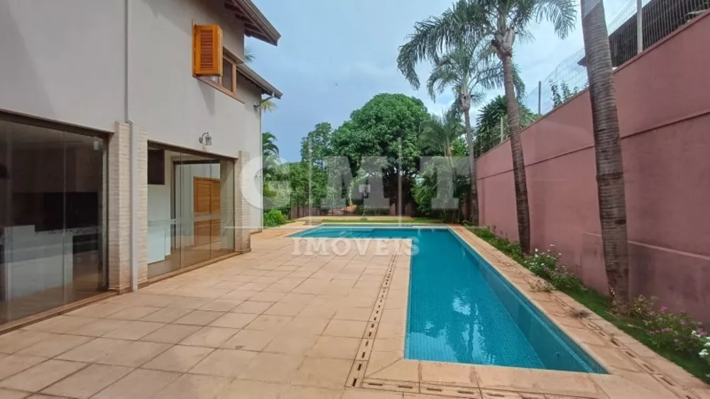 Casa de Condomínio à venda com 4 quartos, 397m² - Foto 2