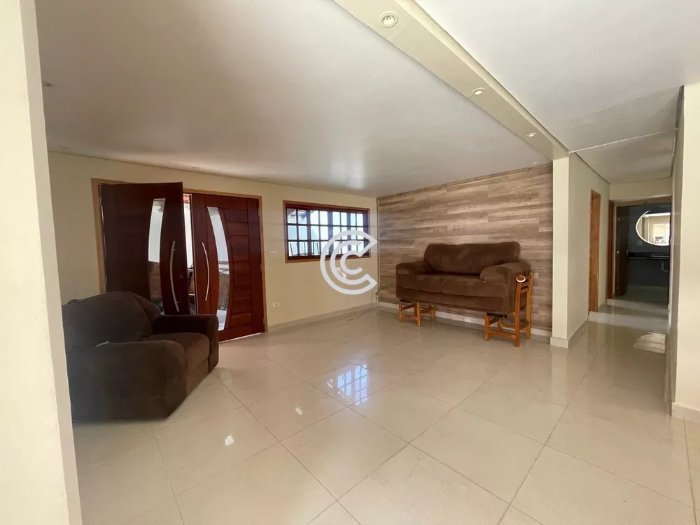 Casa à venda com 3 quartos, 100m² - Foto 1