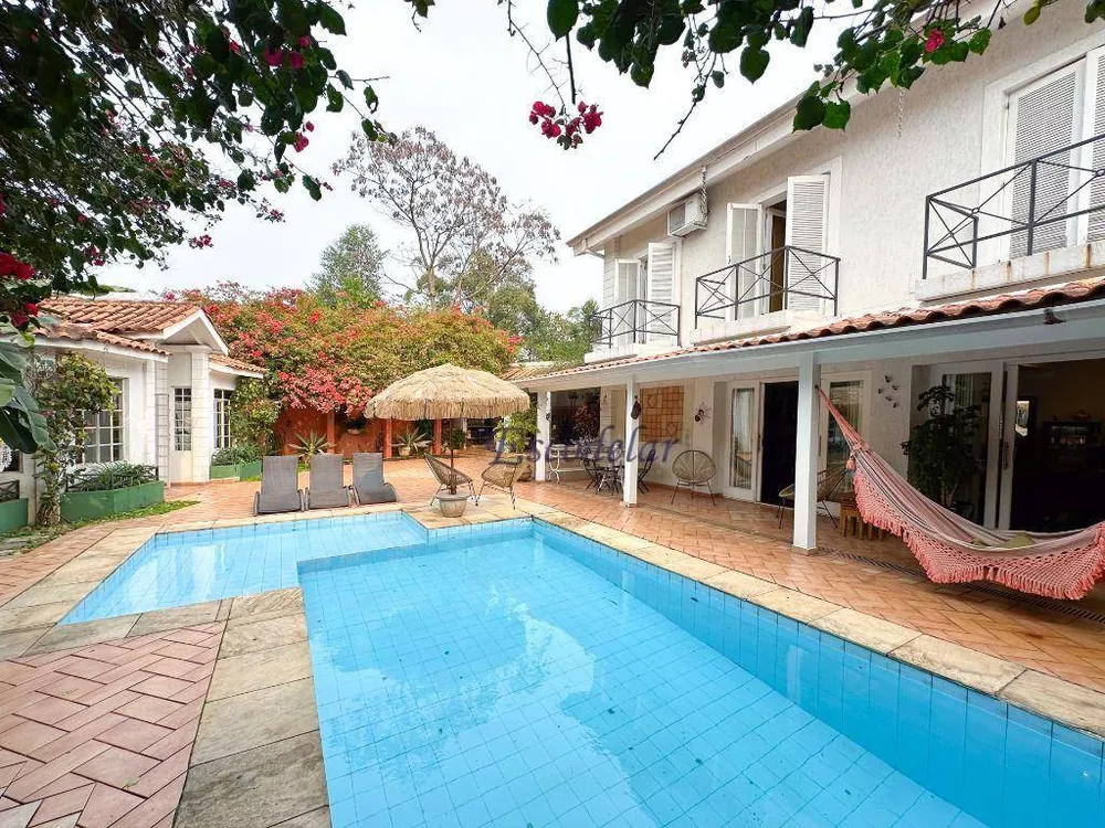 Casa de Condomínio à venda com 4 quartos, 402m² - Foto 1