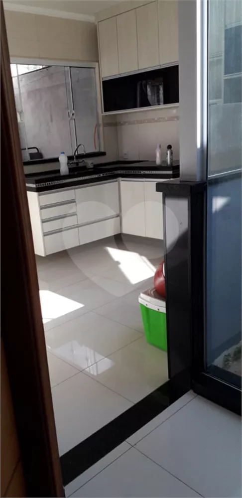 Casa à venda com 4 quartos, 218m² - Foto 2