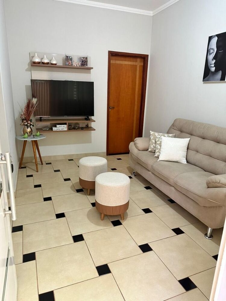 Casa à venda com 3 quartos, 93m² - Foto 1