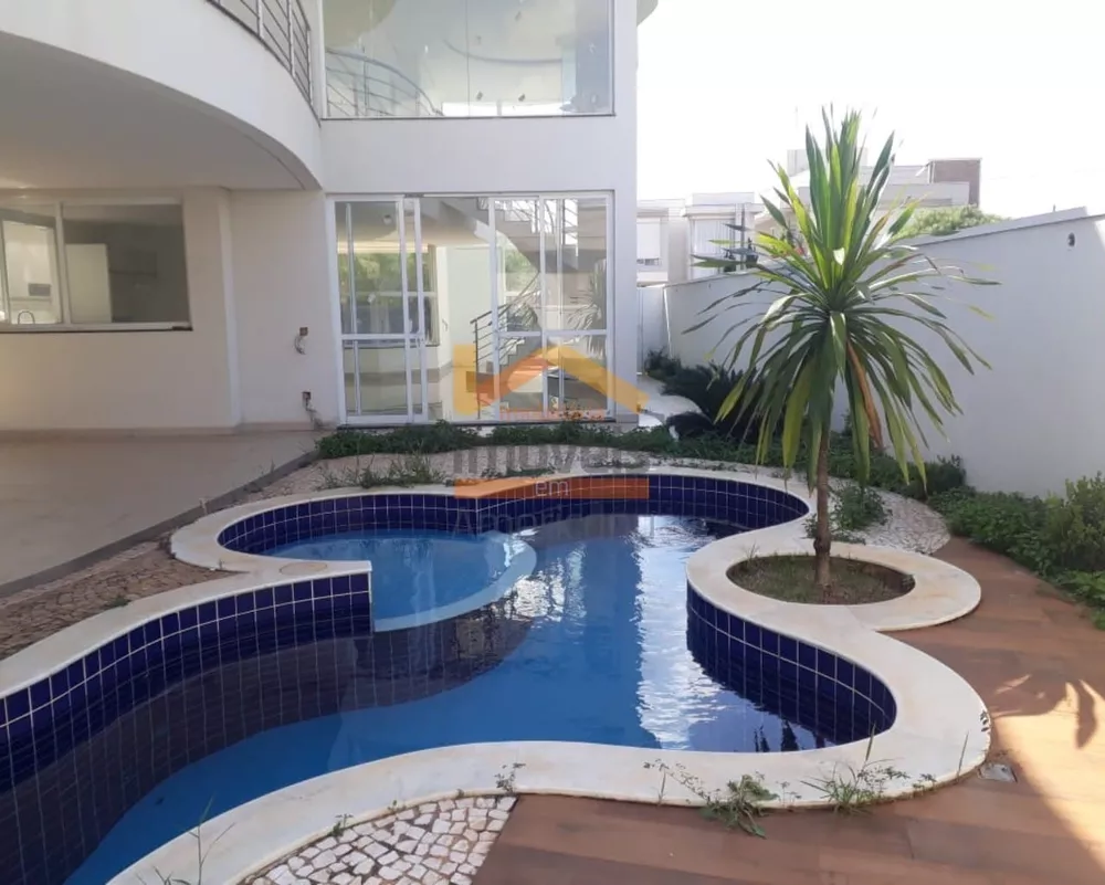 Casa de Condomínio à venda e aluguel com 3 quartos, 360m² - Foto 1