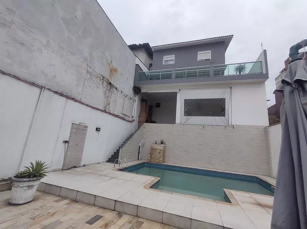 Casa à venda com 4 quartos, 335m² - Foto 1