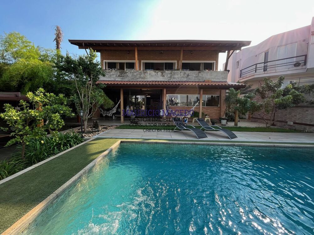 Casa à venda e aluguel com 3 quartos, 304m² - Foto 1