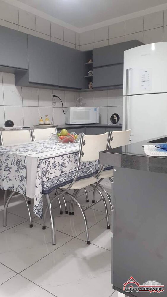 Casa à venda com 3 quartos, 127m² - Foto 1