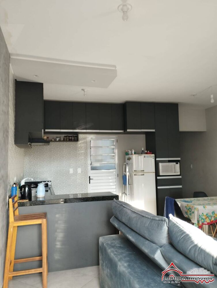 Casa à venda com 3 quartos, 73m² - Foto 4