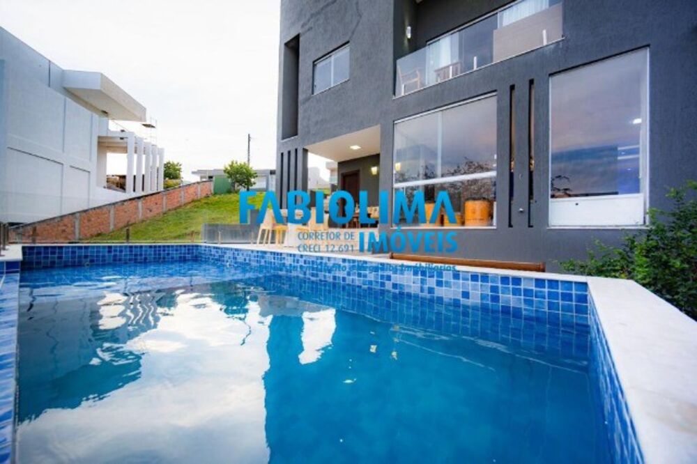 Casa de Condomínio à venda com 4 quartos, 390m² - Foto 1