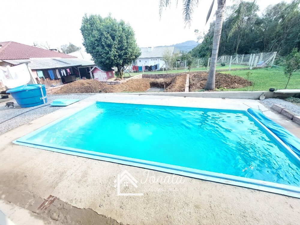 Casa à venda com 5 quartos, 168m² - Foto 5