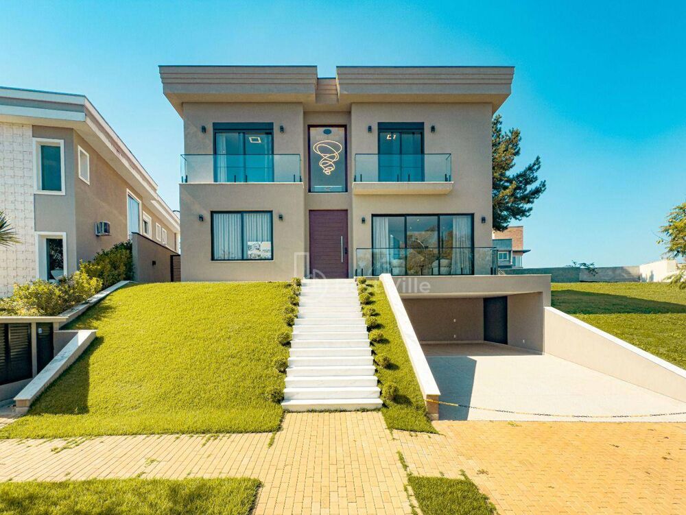 Casa de Condomínio à venda com 4 quartos, 365m² - Foto 1