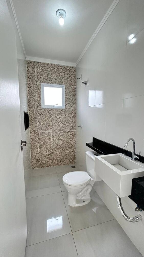 Casa à venda com 3 quartos, 164m² - Foto 1
