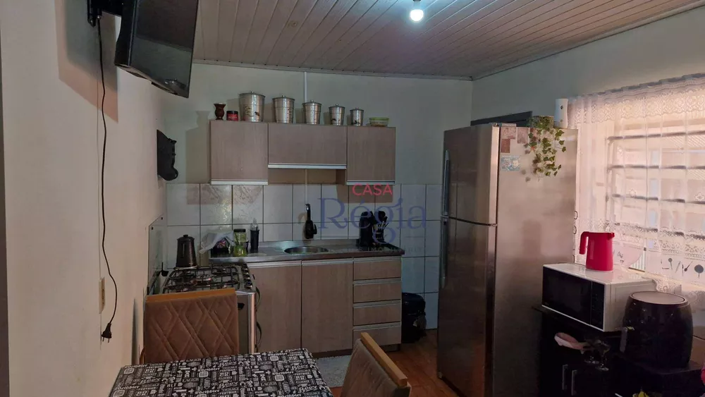 Casa à venda com 4 quartos, 149m² - Foto 4