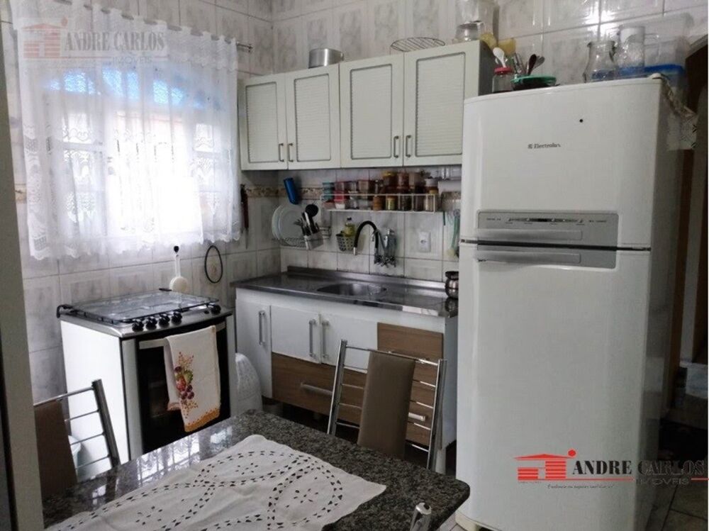 Casa à venda com 4 quartos, 165m² - Foto 4