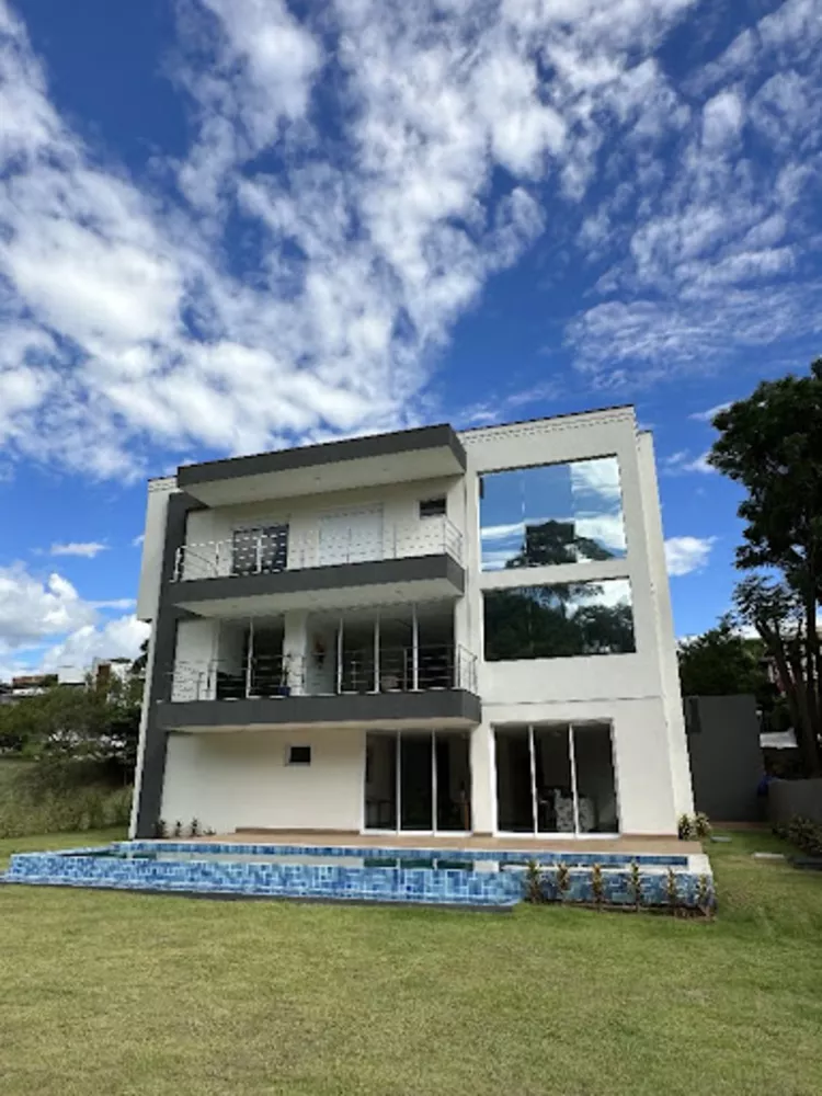 Casa de Condomínio à venda e aluguel com 5 quartos, 550m² - Foto 3