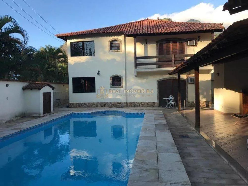 Casa à venda com 6 quartos, 750m² - Foto 1