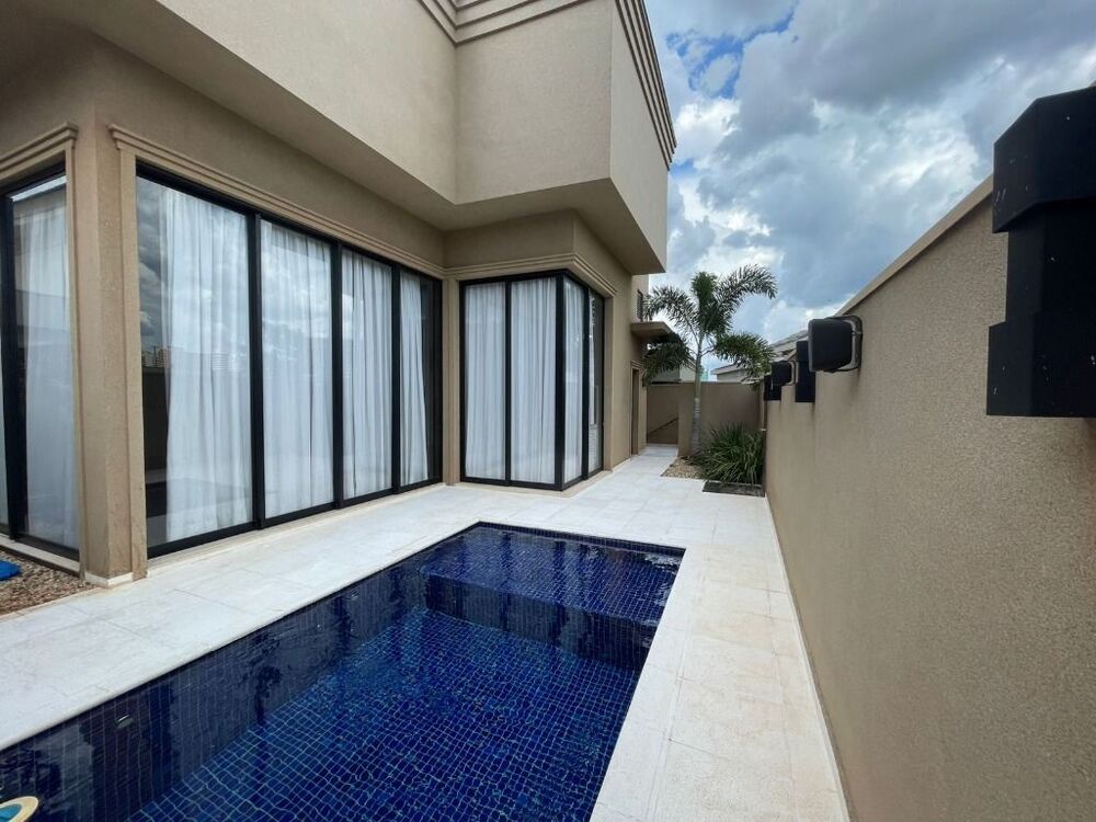 Casa de Condomínio à venda e aluguel com 3 quartos, 242m² - Foto 1
