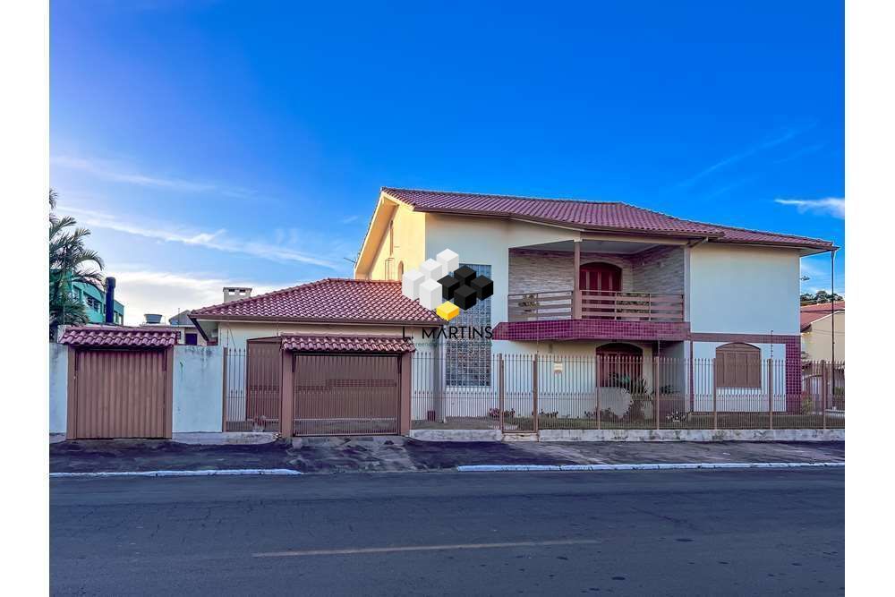 Casa à venda com 3 quartos, 256m² - Foto 1
