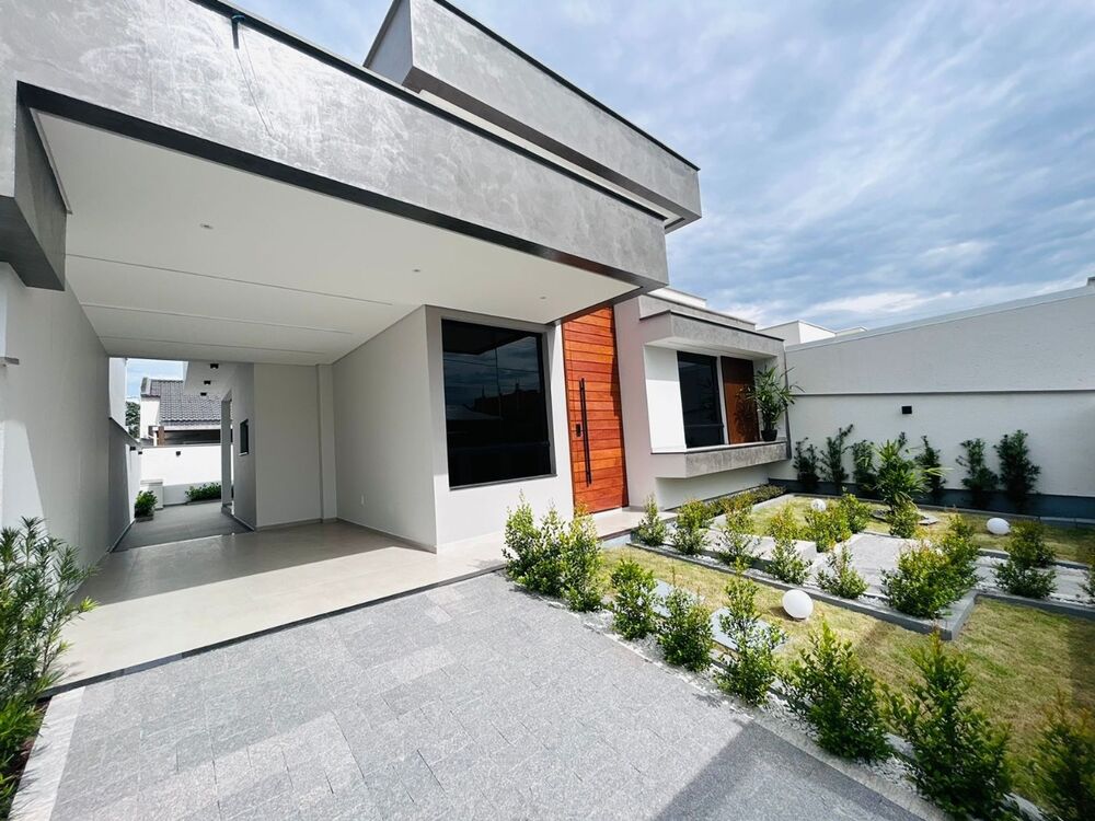 Casa à venda com 3 quartos, 100m² - Foto 1
