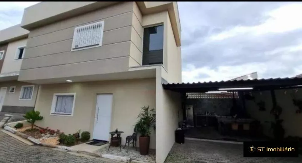 Casa à venda com 3 quartos, 100m² - Foto 1