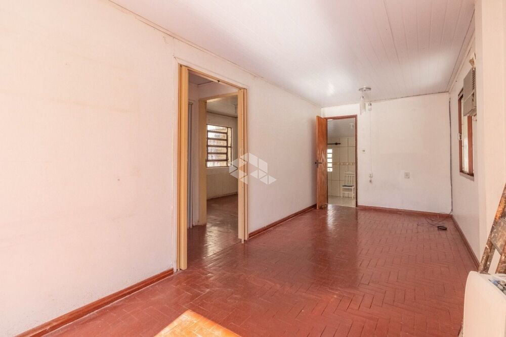 Casa à venda com 3 quartos, 56m² - Foto 1