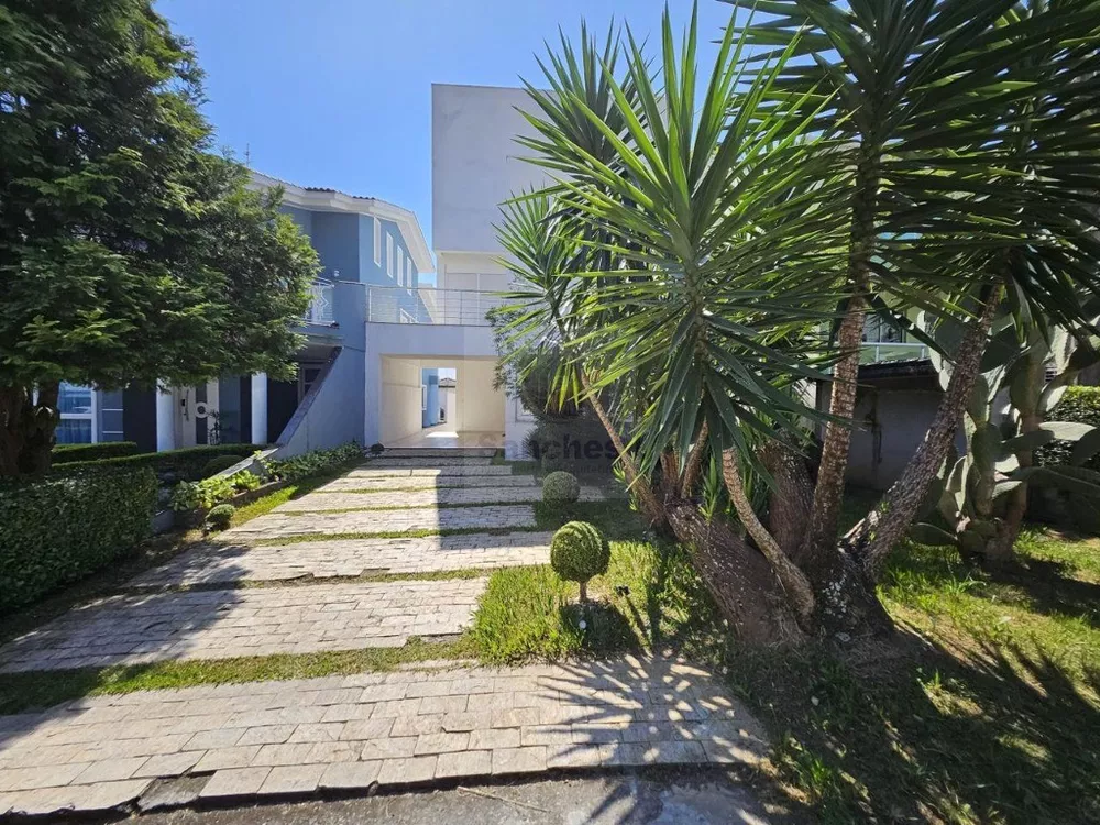 Casa de Condomínio para alugar com 4 quartos, 300m² - Foto 3