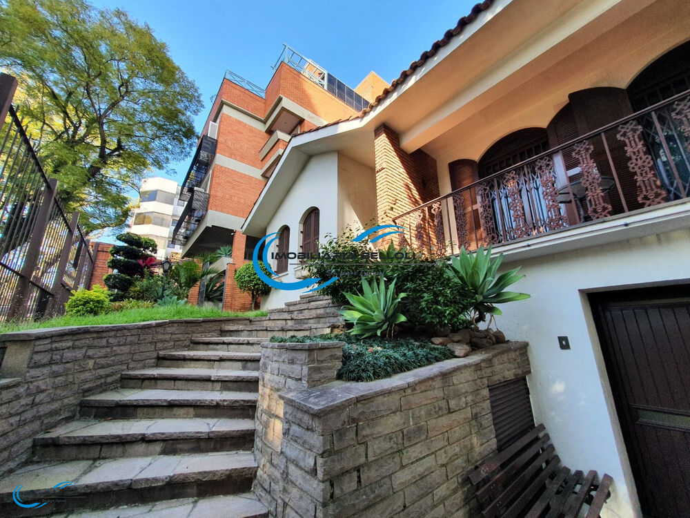 Casa à venda com 4 quartos, 265m² - Foto 1