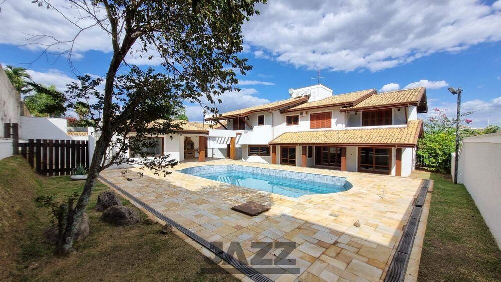 Casa de Condomínio para alugar com 4 quartos, 450m² - Foto 1