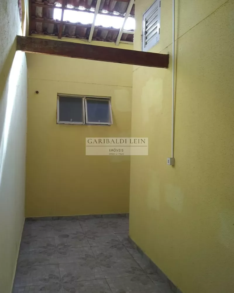 Casa à venda com 3 quartos, 70m² - Foto 14