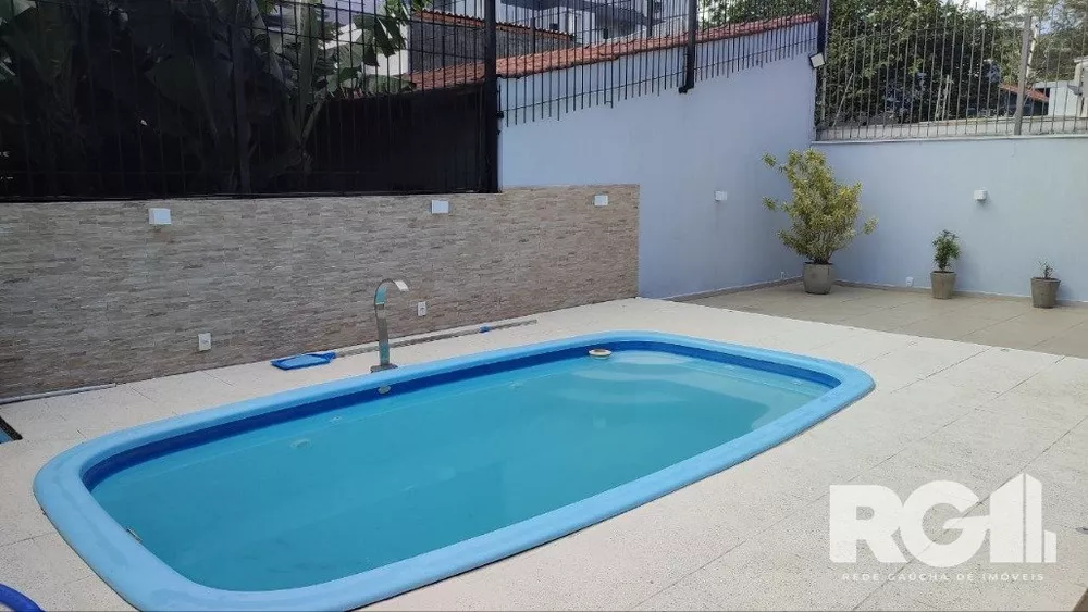 Casa à venda com 3 quartos, 261m² - Foto 1