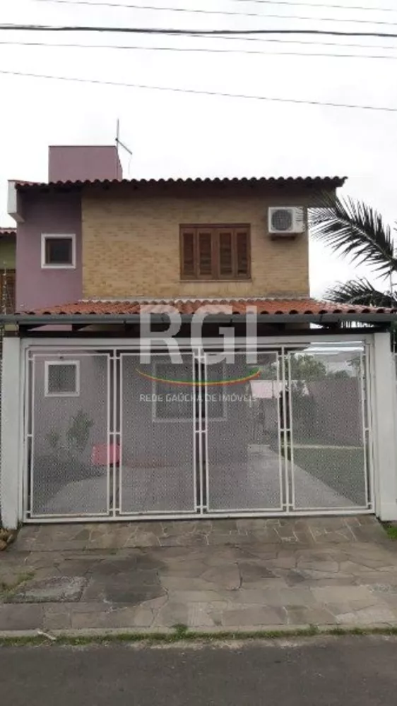 Casa à venda com 3 quartos, 99m² - Foto 1