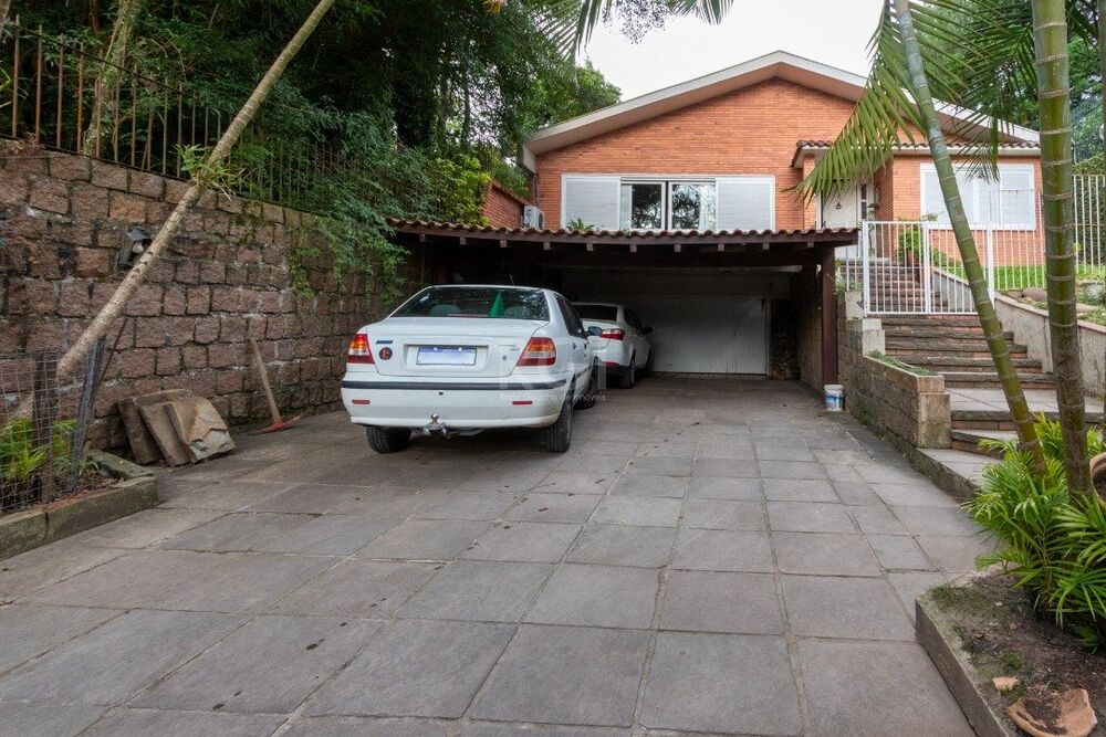 Casa à venda com 4 quartos, 301m² - Foto 2