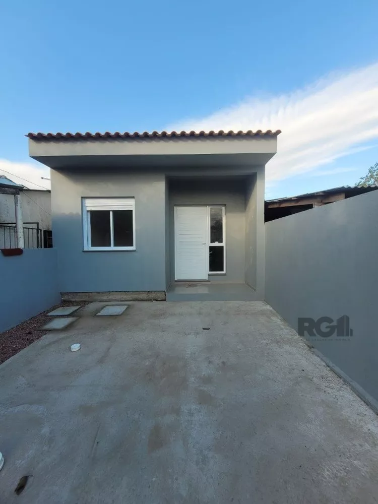 Casa à venda com 3 quartos, 64m² - Foto 1