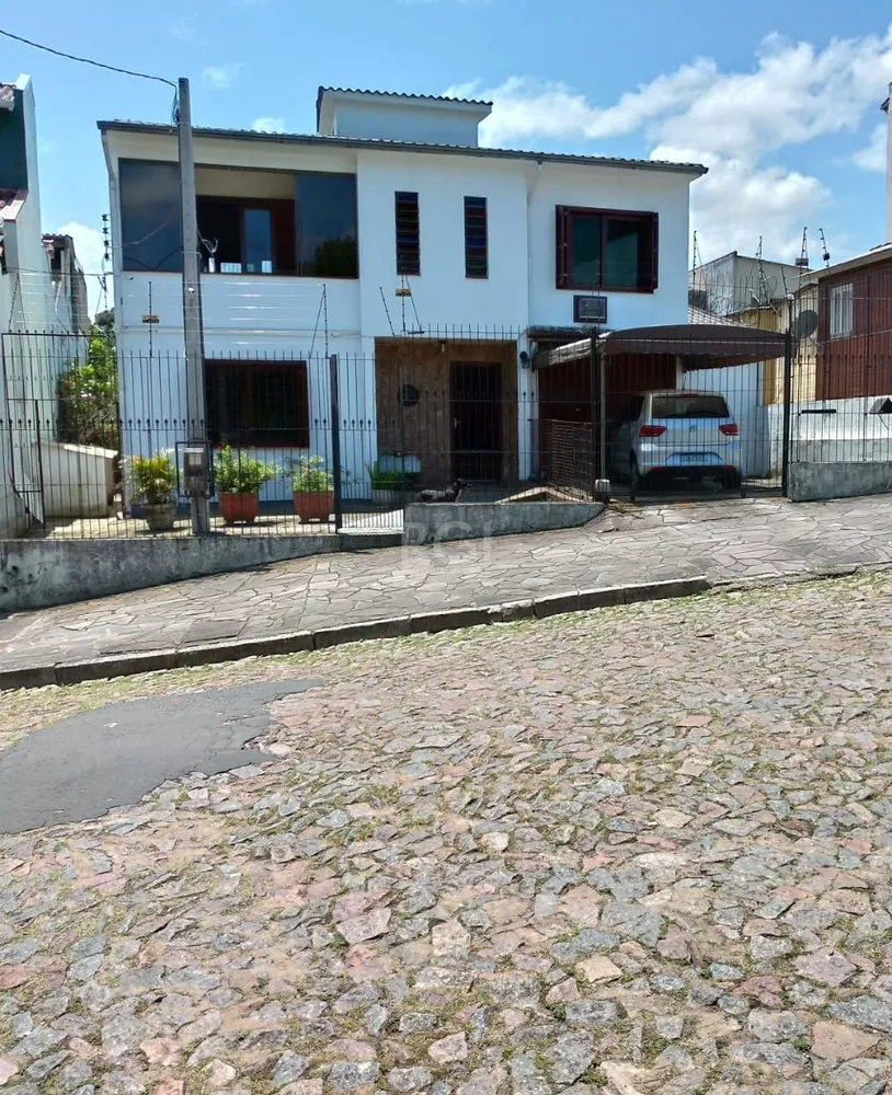 Casa à venda com 3 quartos, 164m² - Foto 1