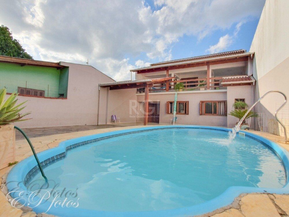 Casa à venda com 5 quartos, 294m² - Foto 1